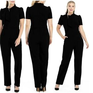 Brand New Maggy London Twist tie Neck short sleeve jumpsuit size 14